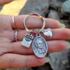 Saint Medal with apple and crayon charms